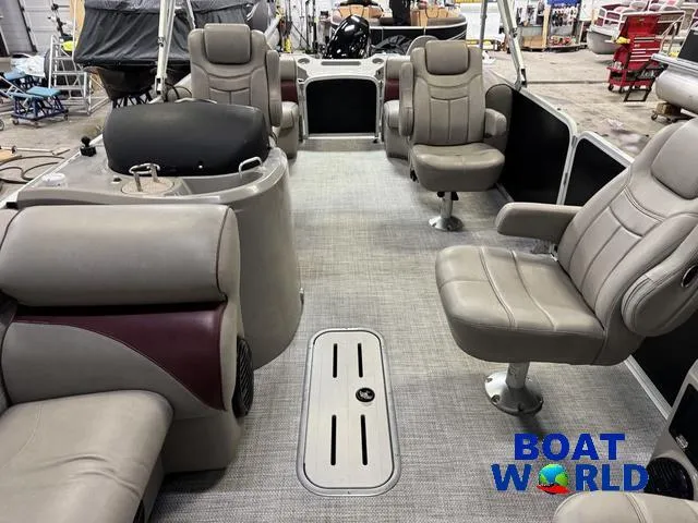 Slide: The Image of 2019 Premier Alante 240 DL pontoon boat interior with plush seating and modern design. - 19