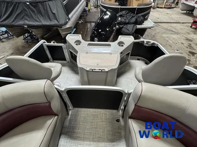 Slide: The Image of 2019 Premier Alante 240 DL pontoon boat interior with seating and console, displayed at Boat World. - 22