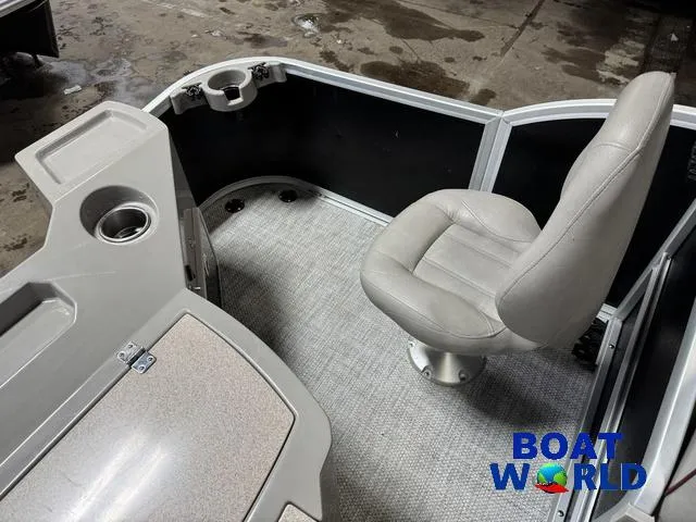 Slide: The Image of 2019 Premier Alante 240 DL boat interior with gray seating and cup holders. - 28