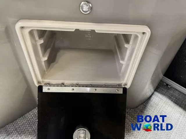 Slide: The Image of Storage compartment in 2019 Premier Alante 240 DL boat interior, featuring Boat World logo. - 32