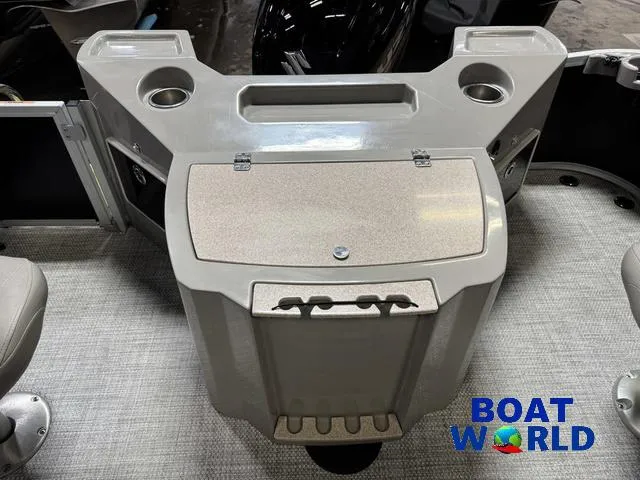 Slide: The Image of 2019 Premier Alante 240 DL boat console with cup holders and storage, Boat World logo visible. - 33