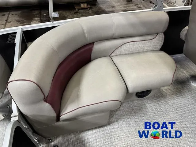Slide: The Image of Premier Alante 240 DL 2019 boat seating with beige and maroon upholstery, Boat World logo visible. - 36