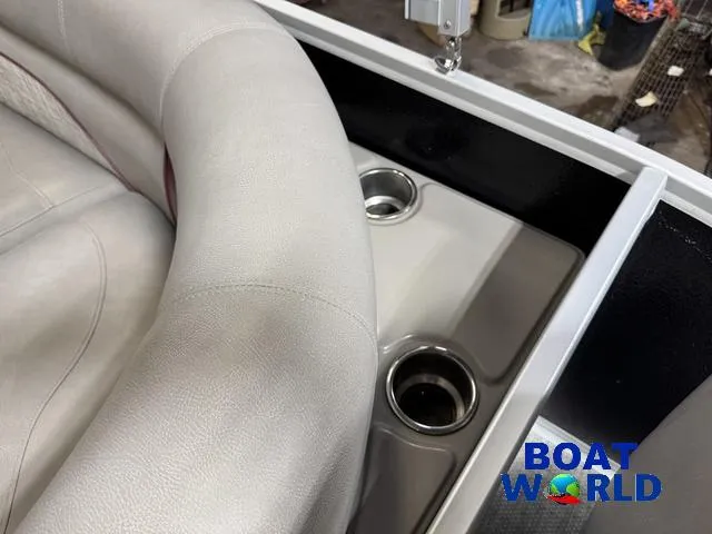 Slide: The Image of 2019 Premier Alante 240 DL boat interior with cup holders and seating. - 39