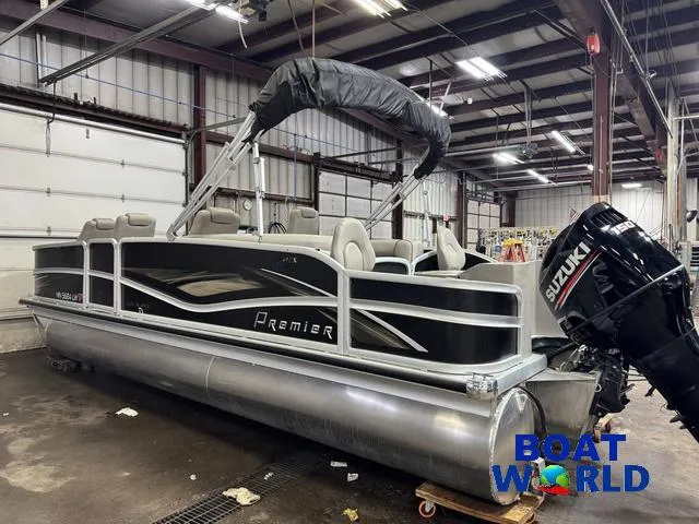 Slide: The Image of 2019 Premier Alante 240 DL pontoon boat in a warehouse with Suzuki outboard motor. - 4