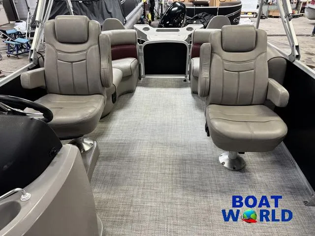 Slide: The Image of 2019 Premier Alante 240 DL boat interior with gray seating and carpeted floor. - 43