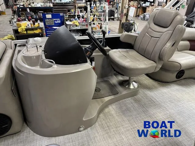 Slide: The Image of 2019 Premier Alante 240 DL boat interior with captain's chair and steering console at Boat World. - 46