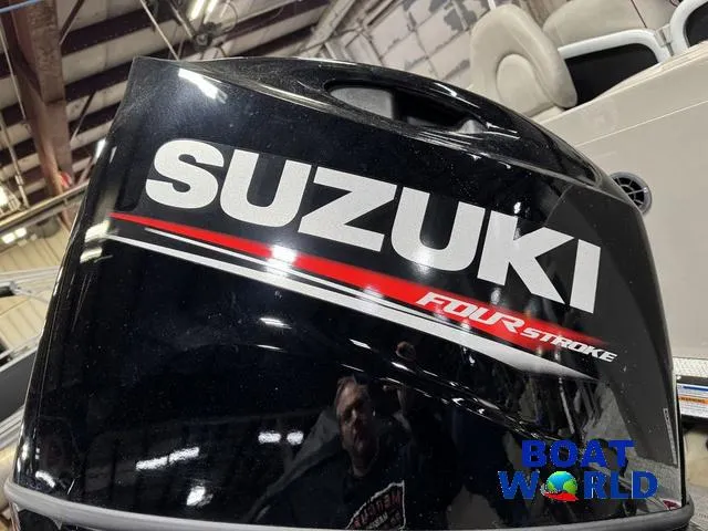 Slide: The Image of 2019 Premier Alante 240 DL with Suzuki four-stroke engine at Boat World showroom. - 6