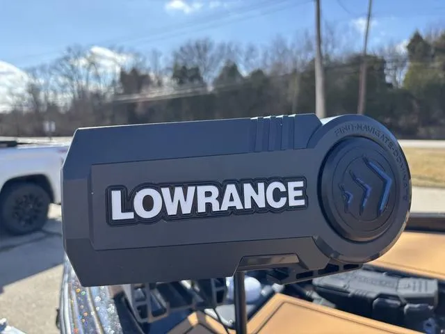 Slide: The Image of Lowrance device on 2025 Caymas XS 21 Pro boat, outdoor setting. - 12