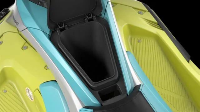 Slide: The Image of 2025 Yamaha Waverunner Jetblaster storage compartment, featuring vibrant blue and yellow design. - 19