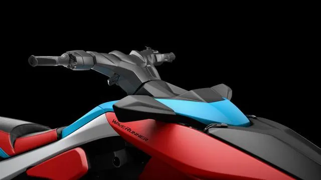 Slide: The Image of 2025 Yamaha Waverunner Jetblaster, sleek design, vibrant red and blue colors, black background. - 16