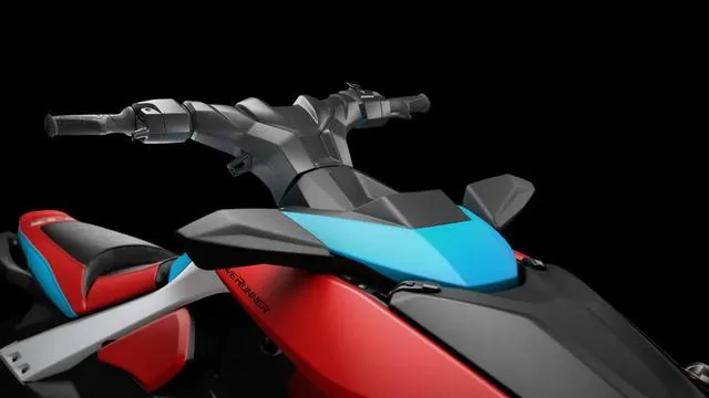 Slide: The Image of 2025 Yamaha Waverunners Jetblaster, sleek design, vibrant red and blue accents, black background. - 17