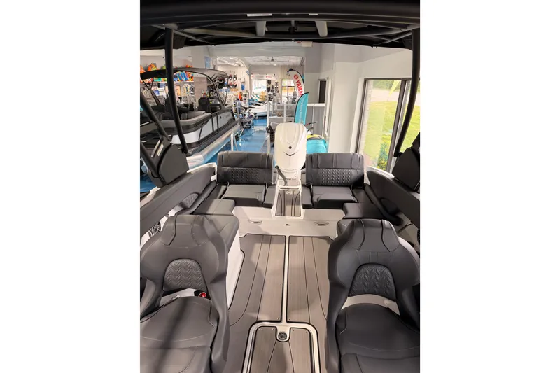 Slide: The Image of 2025 Hurricane Sundeck SD 2600 OB interior with sleek seating and modern design. - 24
