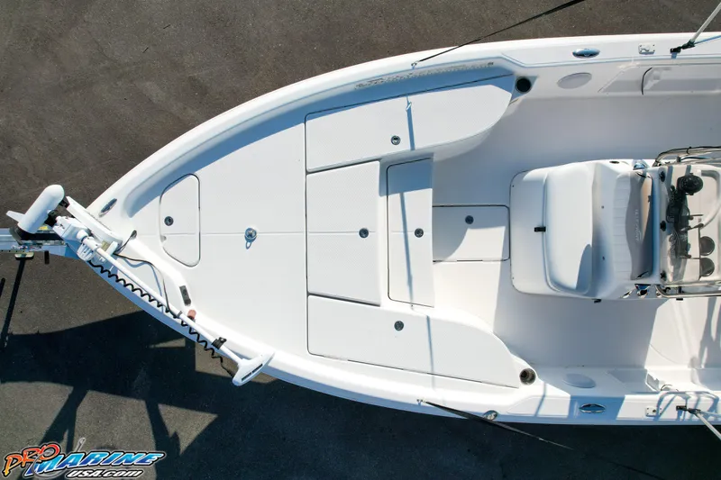 Slide: The Image of 2011 Blue Wave 2200 Pure Bay boat, aerial view, showcasing deck layout and seating. - 20