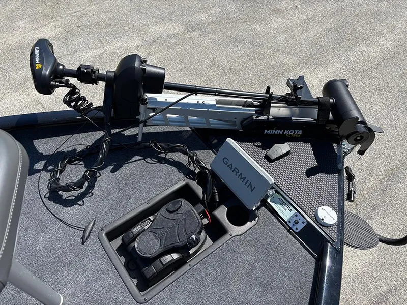 Slide: The Image of Trolling motor and Garmin device on 2025 Tracker Savage 215 boat deck. - 12