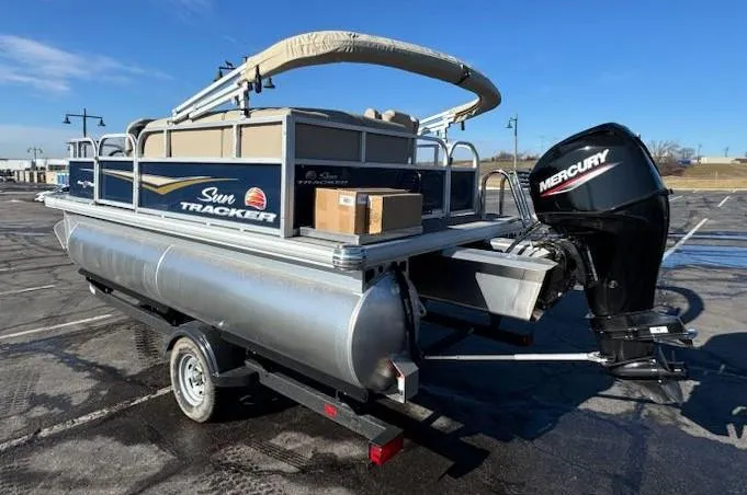 Slide: The Image of 2025 Sun Tracker Bass Buggy 16 XL Select pontoon boat with Mercury engine. - 5