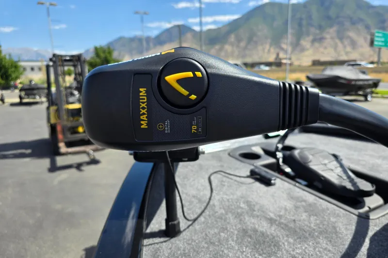 Slide: The Image of Trolling motor on 2025 Tracker Savage 215 boat with mountain backdrop. - 99