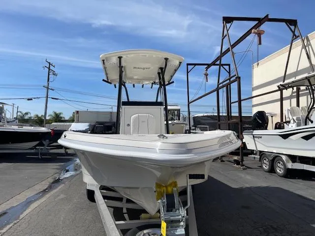 Slide: The Image of 2025 Ranger 2510 Bay boat on trailer in outdoor storage area. - 2