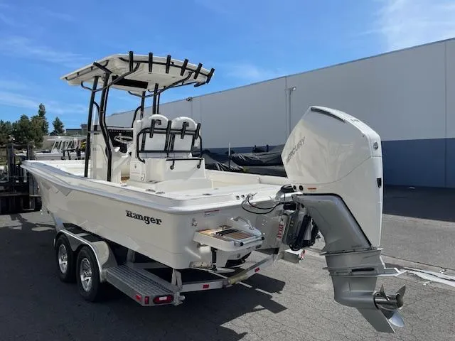 Slide: The Image of 2025 Ranger 2510 Bay boat with outboard motor on trailer. - 4