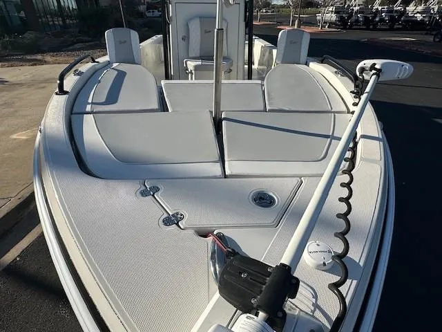 Slide: The Image of 2023 Ranger 2510 Bay boat, front deck view with seating and equipment. - 3
