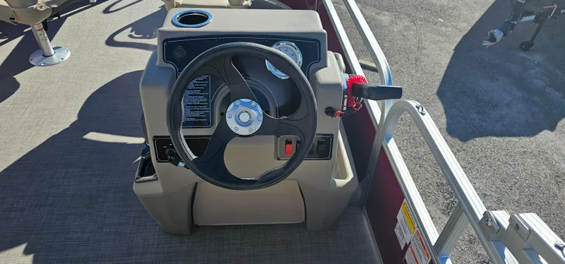 Slide: The Image of Steering console of 2025 Sun Tracker Bass Buggy 16 XL Select pontoon boat. - 8