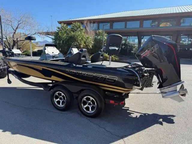 Slide: The Image of 2025 Nitro Z19 Pro boat with dual seats and powerful outboard motor. - 3