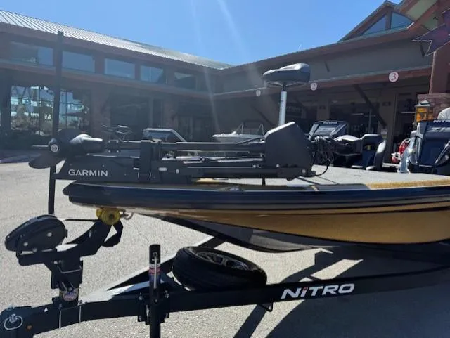 Slide: The Image of 2025 Nitro Z19 Pro boat with Garmin equipment, parked outside a building. - 4