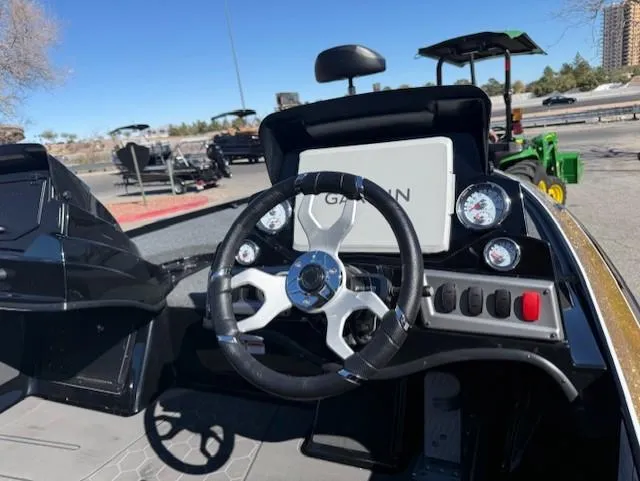 Slide: The Image of 2025 Nitro Z19 Pro boat dashboard with steering wheel and Garmin display. - 5