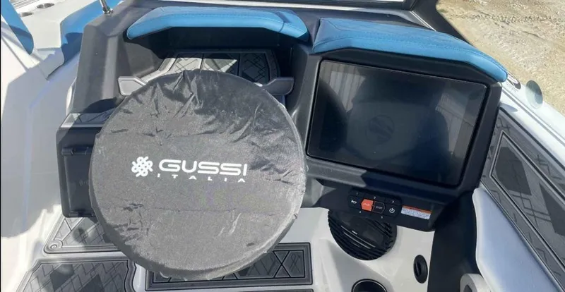 Slide: The Image of 2024 Tigé Z5 boat dashboard with Gussi Italia steering wheel cover. - 7