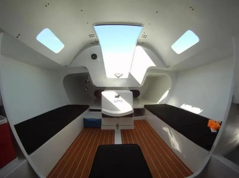 Slide: The Image of Interior of 2012 Columbia Yacht 32, featuring sleek design and ample natural light. - 15