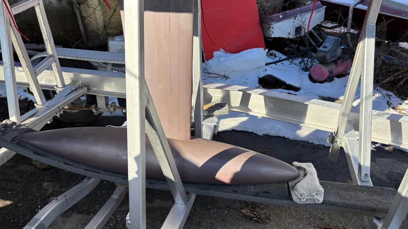 Slide: The Image of Columbia Yacht 32 keel on trailer, 2012 model, in outdoor storage. - 7