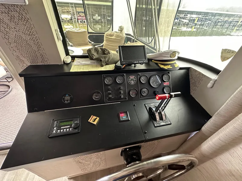 Slide: The Image of Control panel of a 1991 Sumerset 14x60 houseboat with navigation instruments. - 9