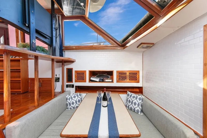 Slide: The Image of Luxurious interior of 1989 Lien Hwa Vitesse Yachtfisher with skylight and elegant dining area. - 17