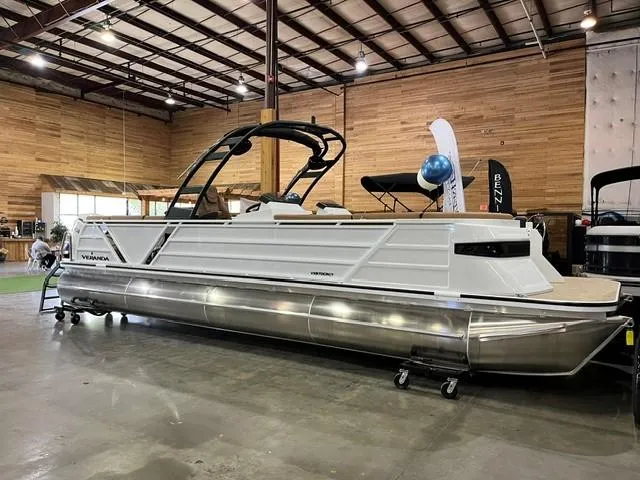 The Image of 2025 Veranda VX27DCRC pontoon boat displayed indoors with sleek design and modern features. - 1