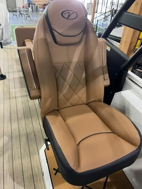 Slide: The Image of 2025 Veranda VX27DCRC luxury boat seat with tan upholstery and diamond stitching. - 6