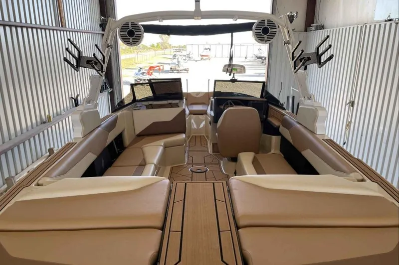 Slide: The Image of 2024 ATX Surf Boats 24 Type-S interior with spacious seating and modern dashboard. - 6