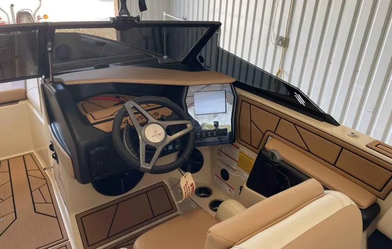 Slide: The Image of 2024 ATX Surf Boats 24 Type-S interior with modern dashboard and steering wheel. - 8