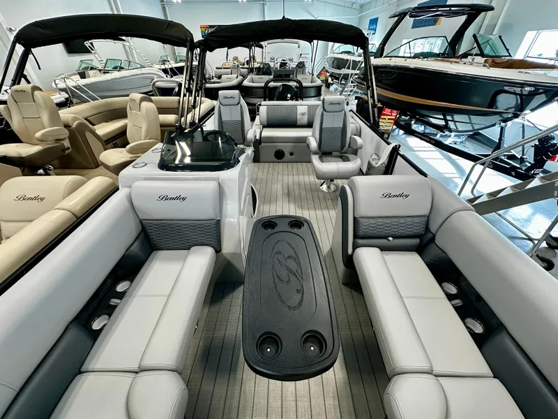 Slide: The Image of 2025 Bentley Pontoons Elite 223 Swingback interior with luxurious seating and modern design. - 6