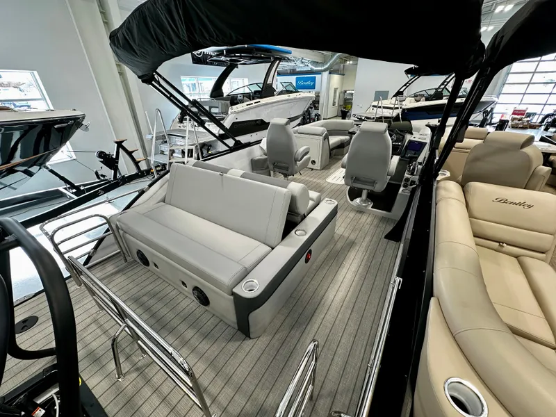 Slide: The Image of 2025 Bentley Pontoons Elite 223 Swingback interior with luxurious seating and modern design. - 7