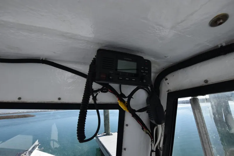 Slide: The Image of Boat interior with mounted radio equipment, Custom Downeast model, 2011. - 12