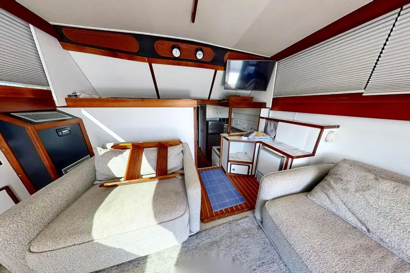Slide: The Image of Interior of a 1973 Viking 40 boat, fully restored with modern furnishings and appliances. - 22