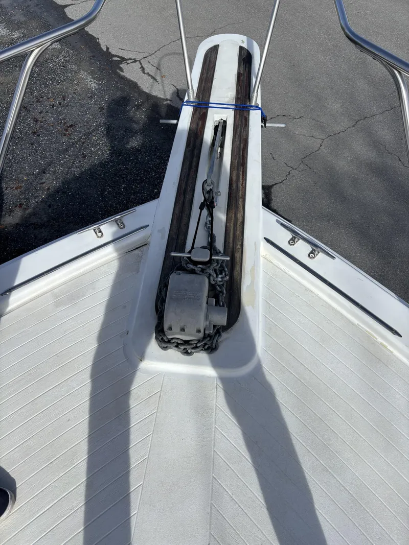 Slide: The Image of Bow of a 1973 Viking 40 boat with anchor chain and winch. - 6