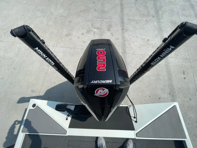 Slide: The Image of 2021 Crestliner 21 MX boat with Mercury engine and Minn Kota trolling motors. - 8