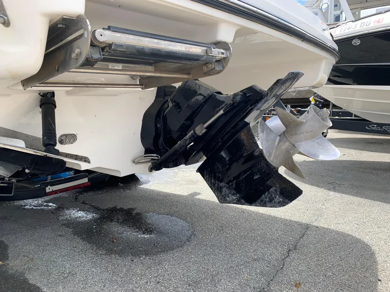 Slide: The Image of 2015 Sea Ray 250 SLX boat propeller and stern detail on display. - 13