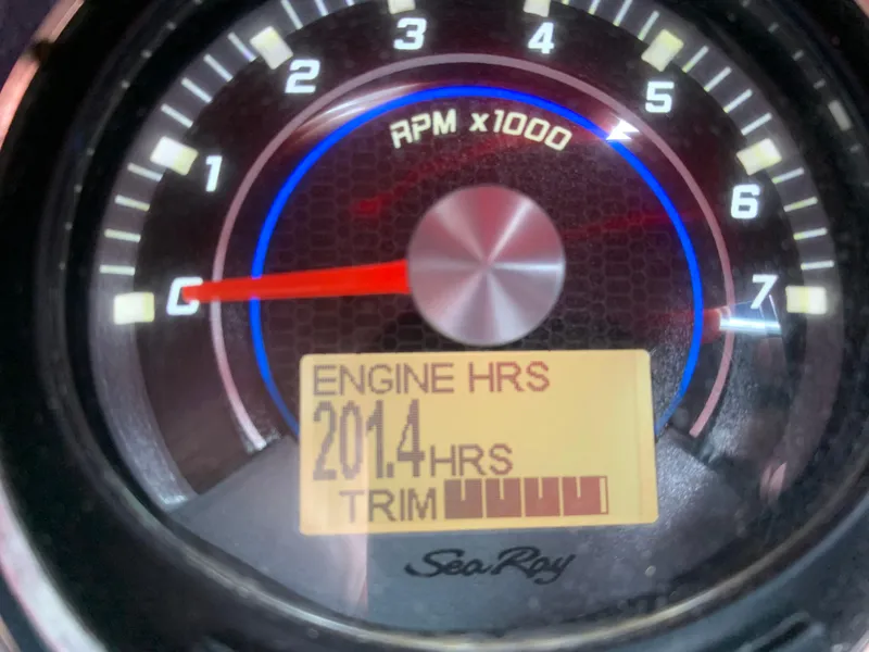 Slide: The Image of Close-up of a 2015 Sea Ray 250 SLX tachometer showing 2014 engine hours. - 8