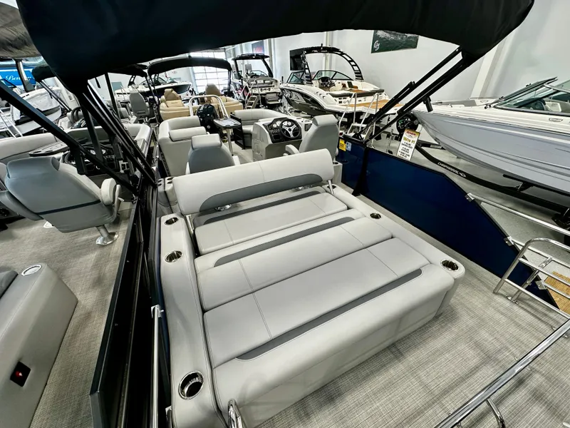 Slide: The Image of 2025 Bentley Pontoons 223 Swingback interior with luxurious seating and modern design. - 4