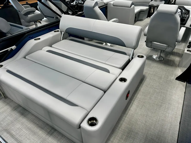Slide: The Image of 2025 Bentley Pontoons 223 Swingback interior with luxurious seating and modern design. - 5