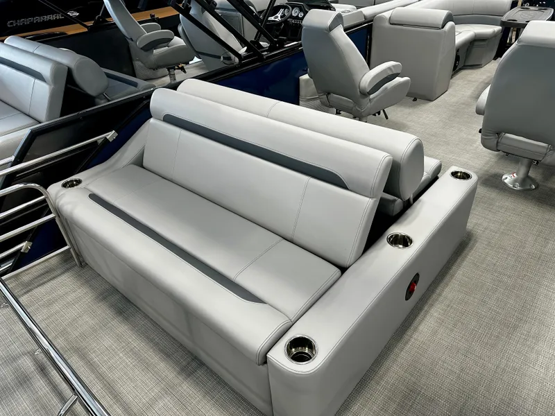 Slide: The Image of 2025 Bentley Pontoons 223 Swingback interior with luxurious seating and cup holders. - 6