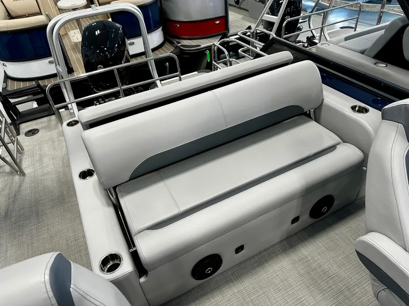 Slide: The Image of 2025 Bentley Pontoons 223 Swingback interior seating with modern design and cup holders. - 7