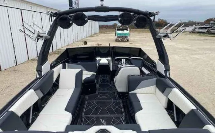 Slide: The Image of 2024 Tigé Z5 boat interior with spacious seating and modern design. - 5