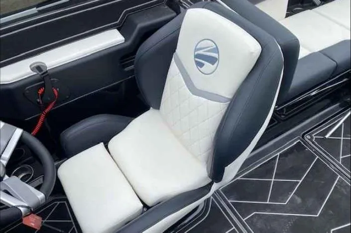 Slide: The Image of 2024 Tigé Z5 boat interior with luxurious seating and modern design. - 7